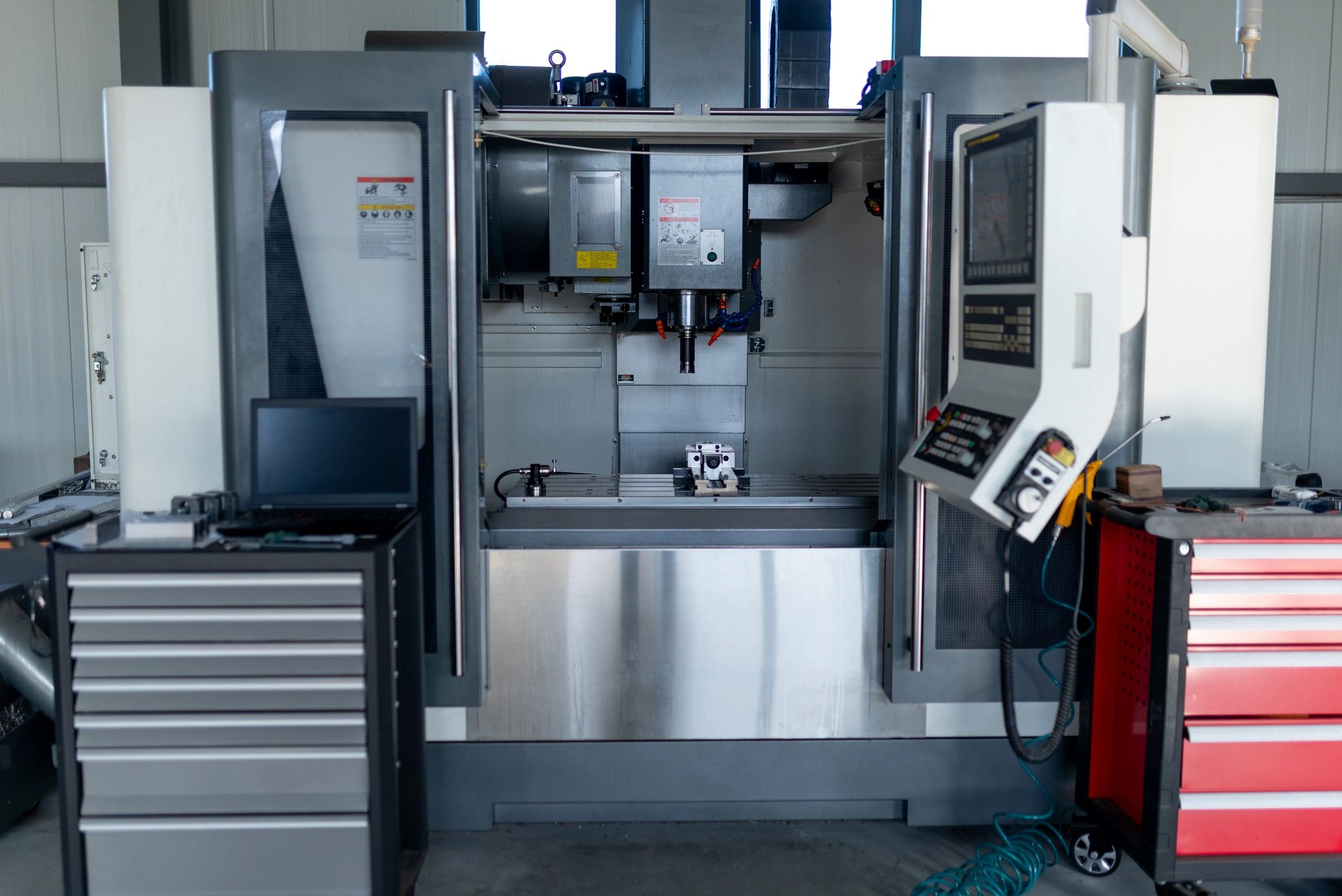 Modern CNC machining center inside an industrial shop