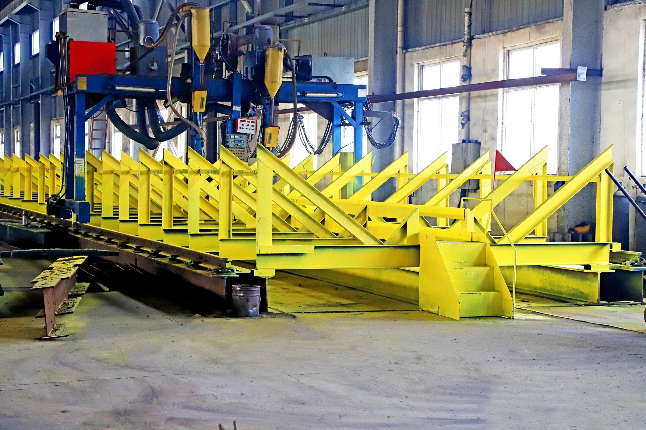 Automated welding equipment working on structural steel components