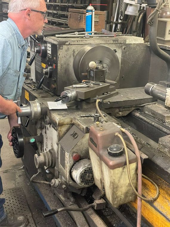Luft Machine machinist working on a lathe